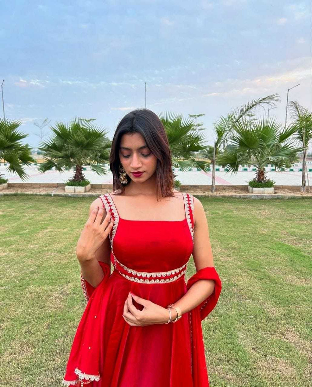 Radiant Red Flared Ethnic Gown with Embellished Detailing