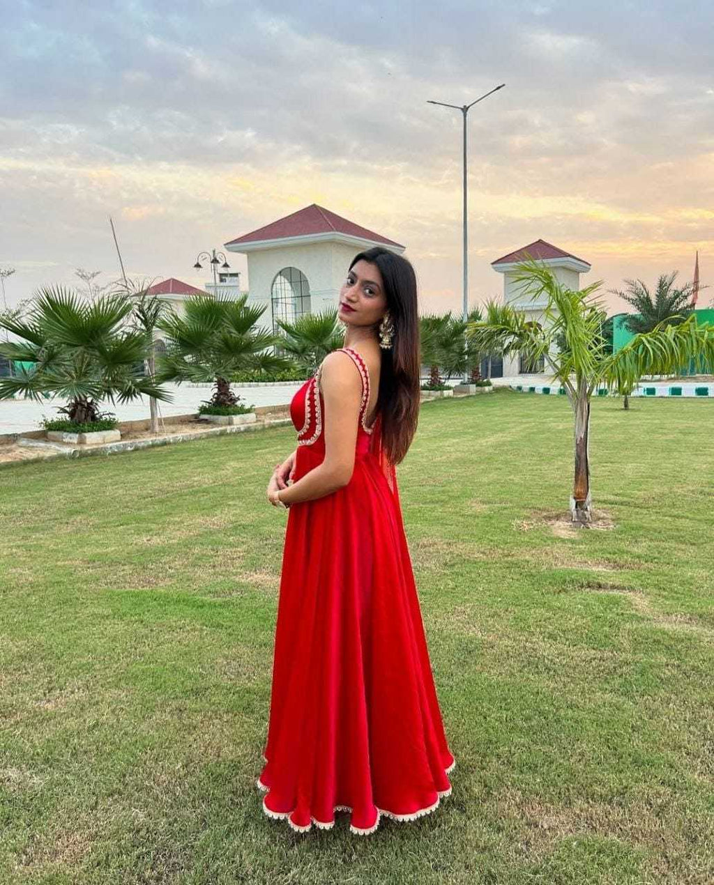 Radiant Red Flared Ethnic Gown with Embellished Detailing