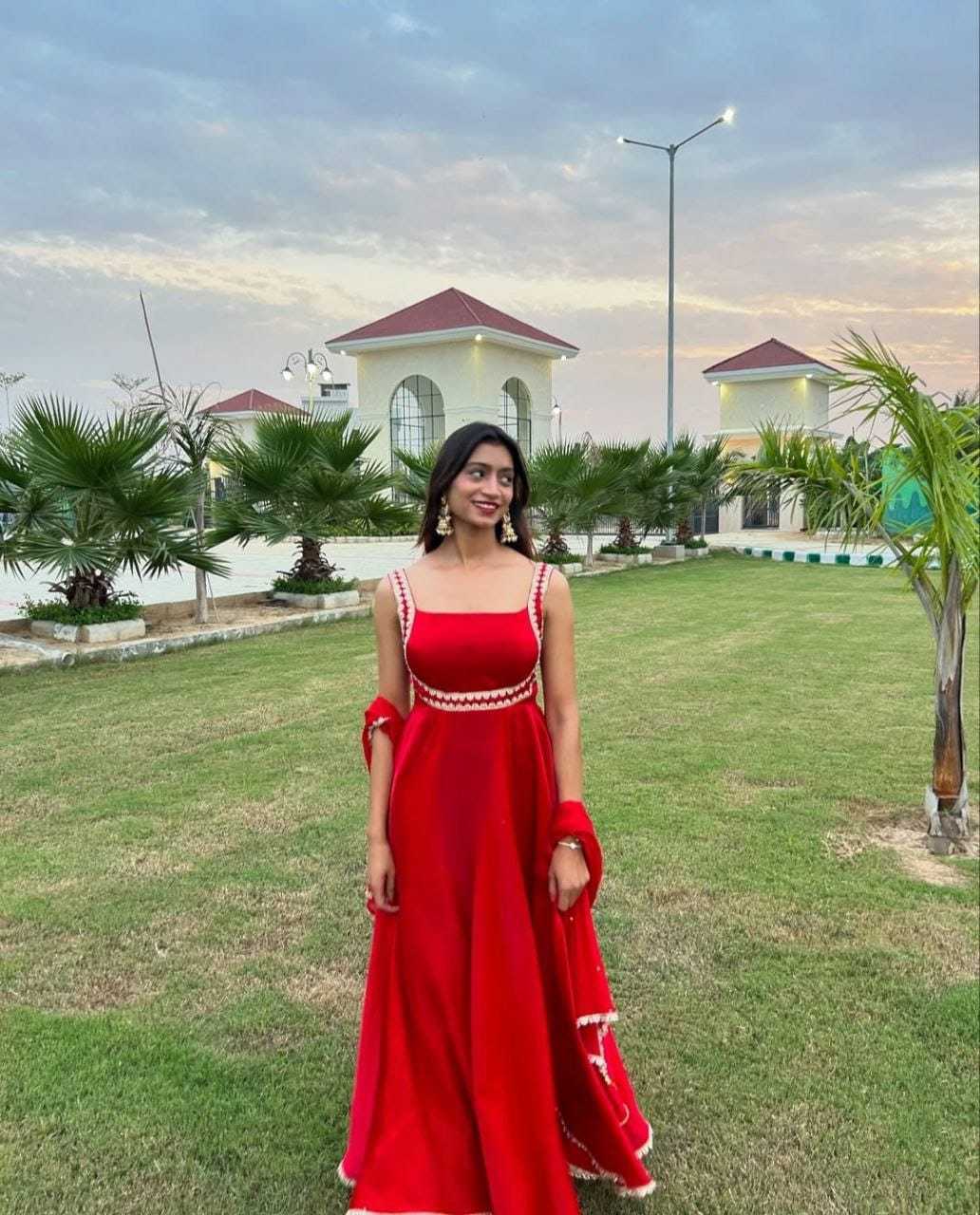 Radiant Red Flared Ethnic Gown with Embellished Detailing